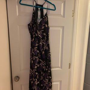 Black and purple floral dress a slight high low effect in the front. NWT